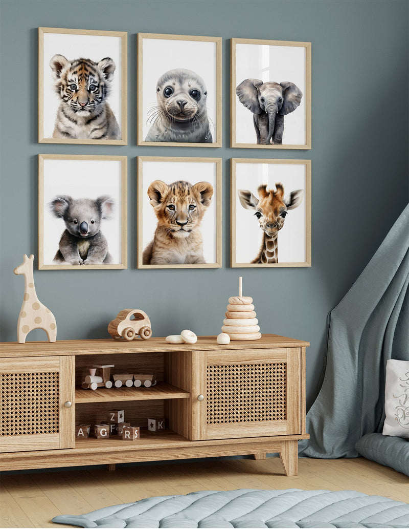 aby safari animal print featuring a playful lion cub, perfect for a nursery wall decor set.